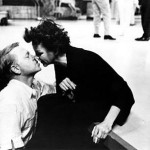 Mickey kissing Judy Garland on movie set